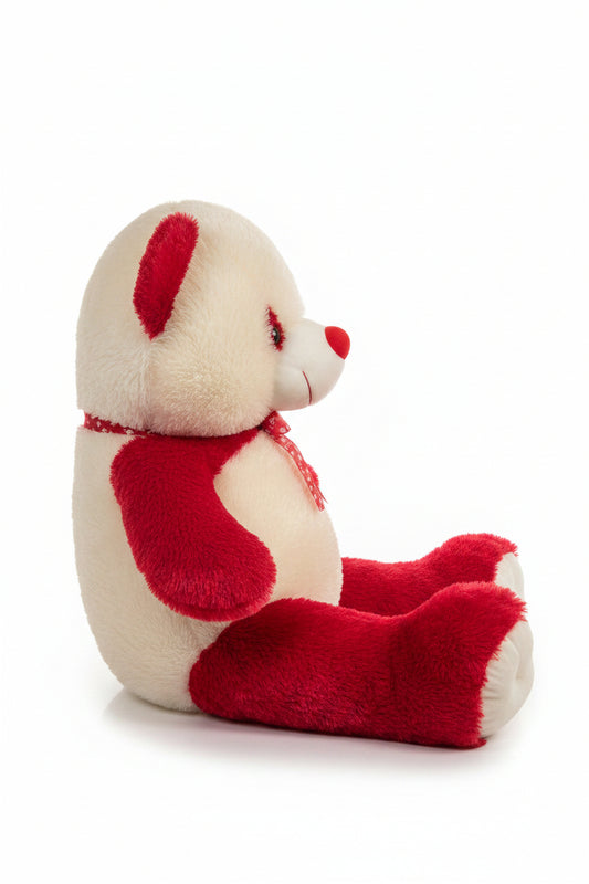 side view of large 3ft red and white teddy bear with soft fur, red paws, and decorative bow