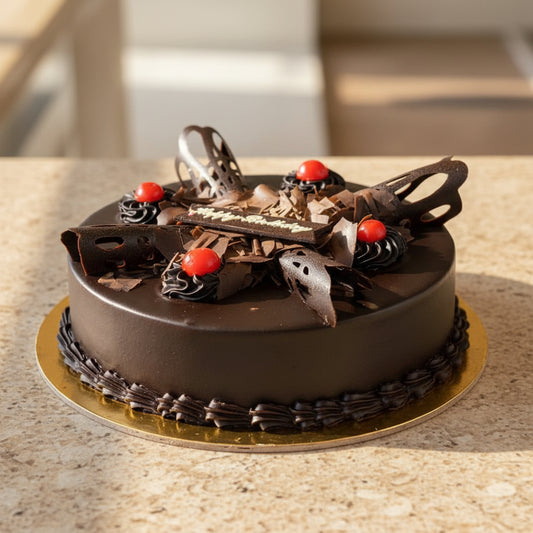 Classic Black Forest Birthday Cake decorated with chocolate shavings and cherries available for online delivery in Kathmandu