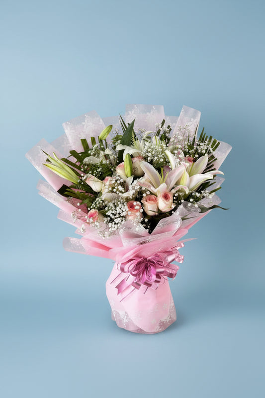 Premium white lily and white rose bouquet available for gift delivery across Kathmandu and Nepal.