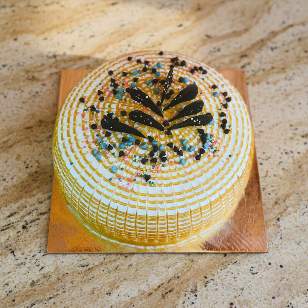 Delicious Banana Celebration Cake freshly baked and delivered across Kathmandu Valley