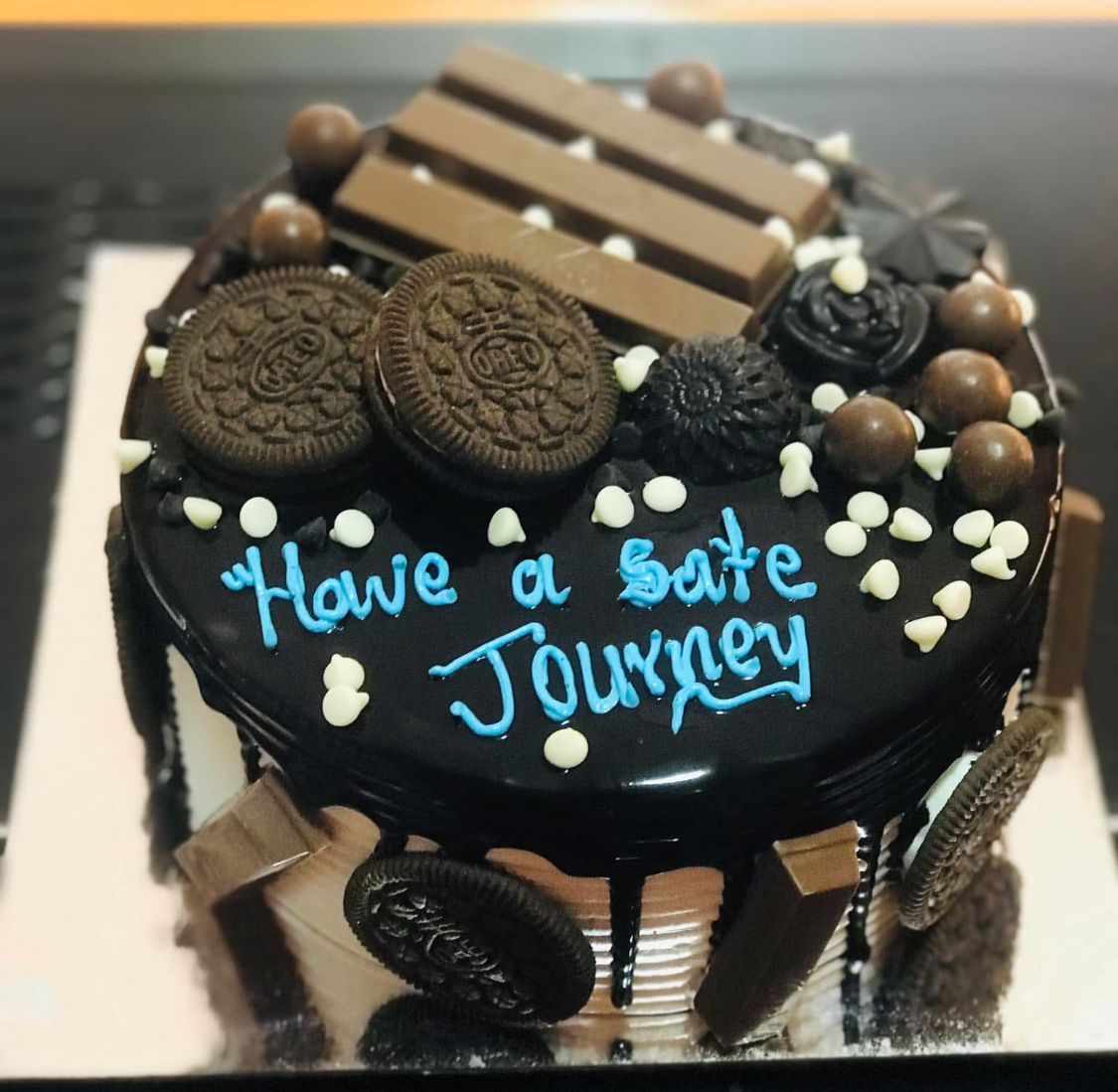 Delicious Oreo Birthday Cake decorated with Oreo cookies and cream available for online delivery in Kathmandu