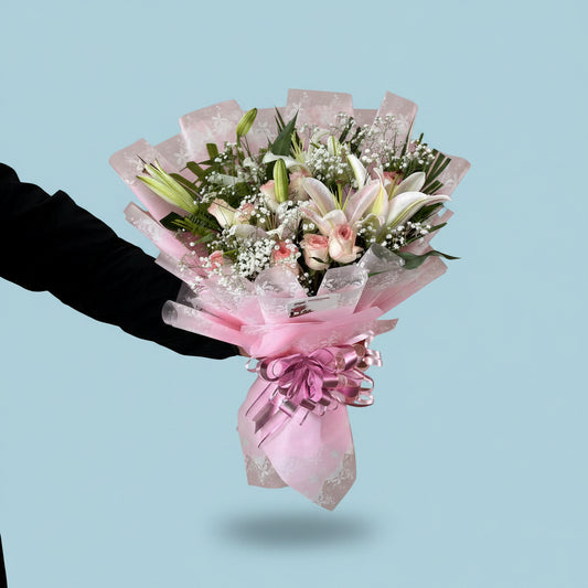 Send gifts to Nepal with this luxury white lily and white rose bouquet, beautifully handcrafted by Mayakobasket.