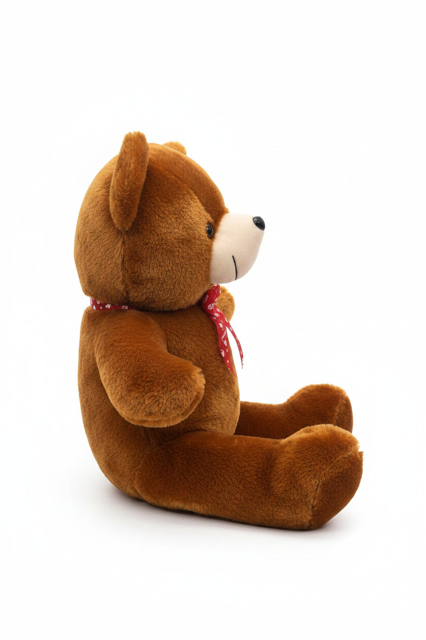 side view of 2ft brown teddy bear soft toy with a red decorative bow